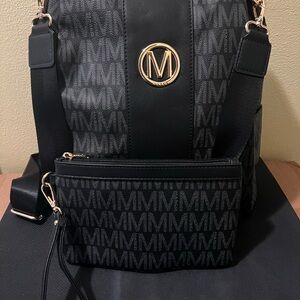 Marco M Kelly Backpack w/wristlet bag(PRE-OWNED) (READ DESCRIPTION)
